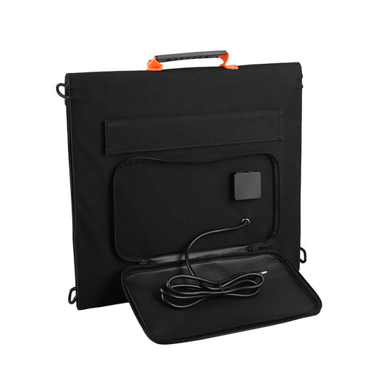 Panneau solaire pliable 100 W LÉOSTRAL déplié en extérieur pour recharger une station électrique